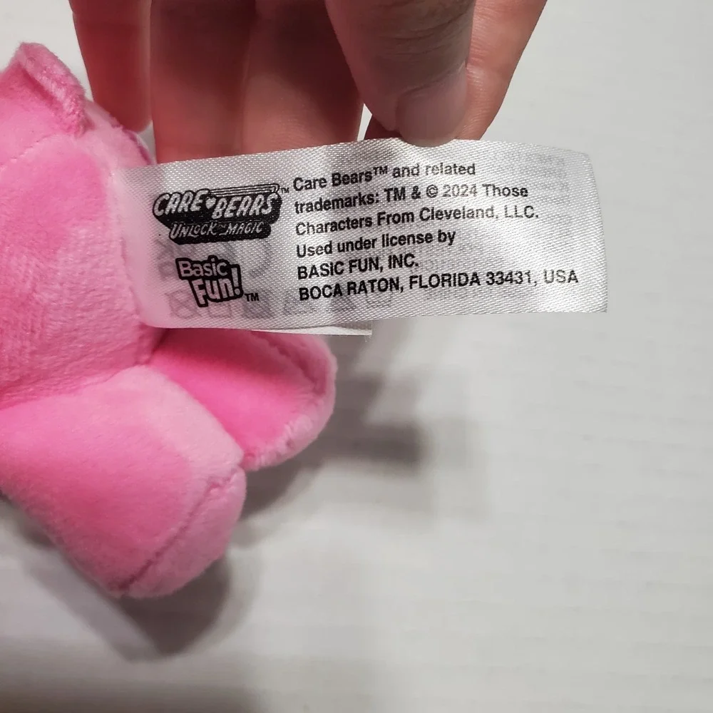 Care Bears Unlock the Magic Cheer Bear Plush Pink Rainbow Clip-On Keychain